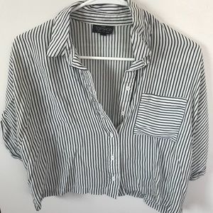 Button down, short sleeve blouse.